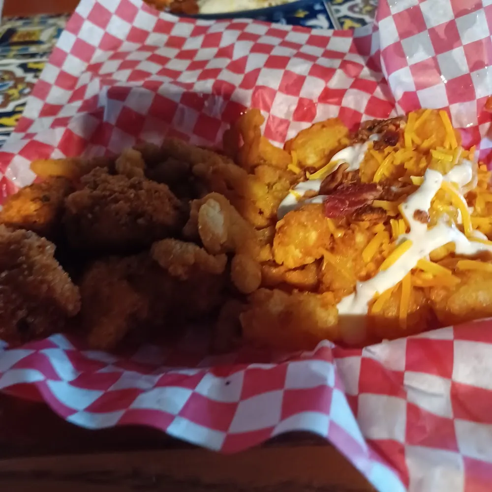 Loaded Tater Tots Clams and Boneless Wings